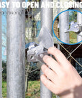 Chain Link Butterfly Gate Latch For One And Three Eighths Inch Gate Frame And Two And Three Eighths Inch Post being opened by hand
