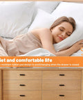 Woman sleeping peacefully, dresser with 20 Pack Black Drawer Stoppers And Slide Bumpers Rubber End Stops for drawers.