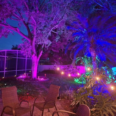Outdoor LED Flood Light Set 800W Equivalent With Bluetooth Smart Color Changing RGB And Warm White 2700K lighting in garden