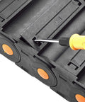 R100 Open Cable Drag Chain Carrier for CNC Machines, close-up showing openable design with screwdriver, 1 meter long, 35x100mm