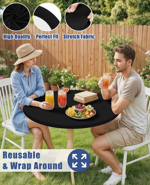 Round Spandex Tablecloth With Elastic Edge No Slip Waterproof Stretch Fit For 45 To 56 Inch Tables Ideal For Indoor Outdoor Dining And Camping Picnics Easy Care Washable Black covering table with people dining outdoors.