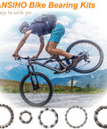 Cyclist performing stunt with Bicycle Ball Bearing Kit With Beefed Up Steel Caged Bearings, 50 Pieces In 10 Sizes For Repair And Maintenance