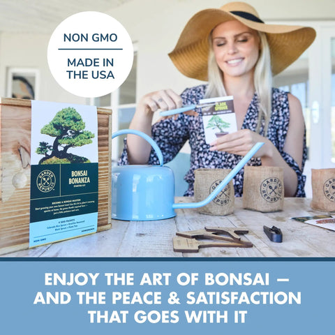 Woman using Bonsai Tree Kit For Beginners Grow Your Own Mini Bonsai With Four Varieties Seed Starter Kit Includes Potting Soil Jute Bags Pruning Shears Plant Markers And Easy Step By Step Guides on table.