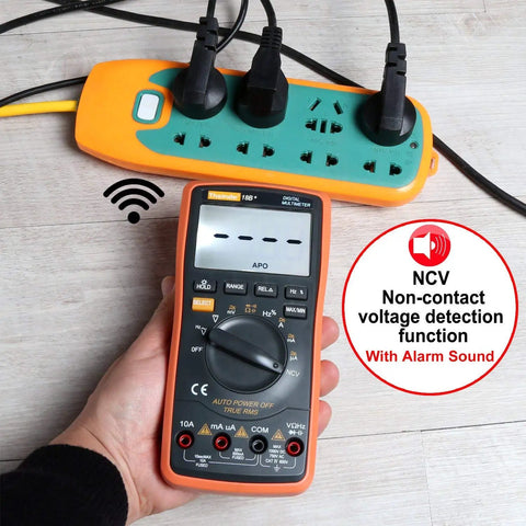 Ranging Digital Multimeter TRMS 6000 with non-contact voltage detection in use with power strip, showing safety features.