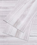 Coastal White Wood Grain Peel And Stick Vinyl Flooring Planks 6x36 In Waterproof Self Adhesive Floor Tiles closeup view