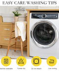 Front view of a washing machine in a laundry room with easy care washing tips icons below, including machine washable and tumble dry.