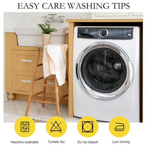Front view of a washing machine in a laundry room with easy care washing tips icons below, including machine washable and tumble dry.