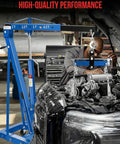 Heavy Duty Two Ton Shop Crane Engine Hoist Smooth Hydraulic Lifter For Auto Shops next to car engine, 2T load rating visible.