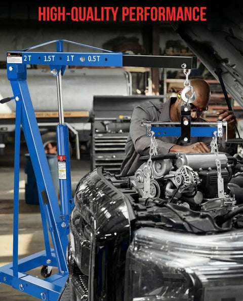 Heavy Duty Two Ton Shop Crane Engine Hoist Smooth Hydraulic Lifter For Auto Shops next to car engine, 2T load rating visible.