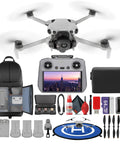 Mini 5 Pro Drone RC2 Fly More Bundle With Extra Battery And 64GB Card Landing Pad Portable Kit displayed with accessories