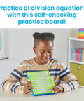 Child using Division Practice Board With Self-Checking Dials For Kids in classroom setting, building fluency and confidence.