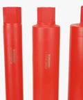 Four red BLUEROCK diamond wet core drill bits set with threaded shanks.