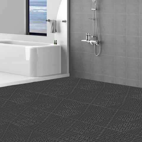 Bathroom with interlocking drainage floor tiles 50 piece set black 12 by 12 inch soft PVC mats with non slip drain holes installed
