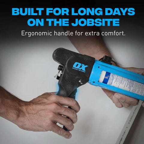 Compact 10 Oz Rodless Caulk Gun For Tight Spaces With 7 To 1 Thrust Ratio And Belt Clip in hand with ergonomic handle