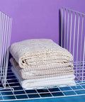 Stacked blankets between dividers on shelf. Twenty Pack Wire Closet Shelf Dividers With 100 Nylon Ties, 12 Inch Vertical Organizers.