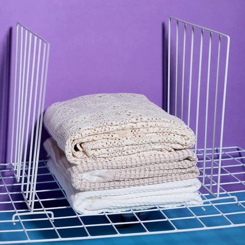 Stacked blankets between dividers on shelf. Twenty Pack Wire Closet Shelf Dividers With 100 Nylon Ties, 12 Inch Vertical Organizers.