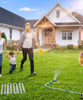 Family in garden with Tough As Nails Heavy Duty Galvanized 5 Inch Lawn Staples 11 Gauge U Shaped Ground Spikes set in grass