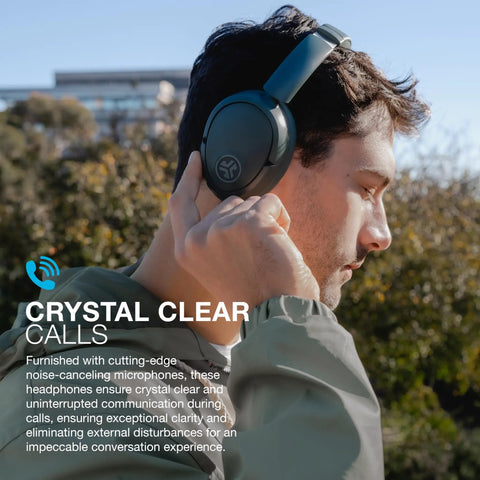 Person wearing JBuds Lux ANC Over Ear Headphones With Wireless Active Noise Cancellation Bluetooth Spatial Audio outdoors