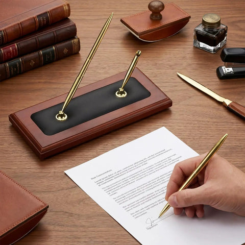 Wood And Leather Double Pen Holder Desk Set With Two Black Pens, Pro Grade Luxury Desk Stand in use with gold accents on desk