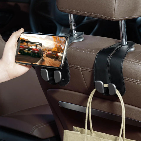 Sleek Double Purse Hook For Car, Universal Auto Seat Back Hanger, Premium Stitched Leather And Alloy Bag Organizer holding a phone and bag.