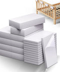 Twenty Two Piece Eva Foam Headboard Stoppers and White Wall Pads stacked for beds, featuring adhesive sides for easy application.