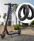 Two Pack 8.5 Inch Heavy Duty Scooter Inner Tubes With TR4A Straight Stem Valve displayed with electric scooter outdoors