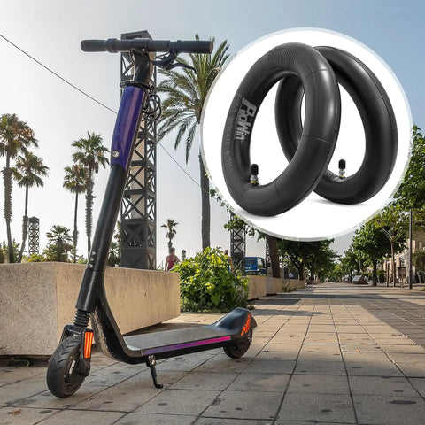 Two Pack 8.5 Inch Heavy Duty Scooter Inner Tubes With TR4A Straight Stem Valve displayed with electric scooter outdoors
