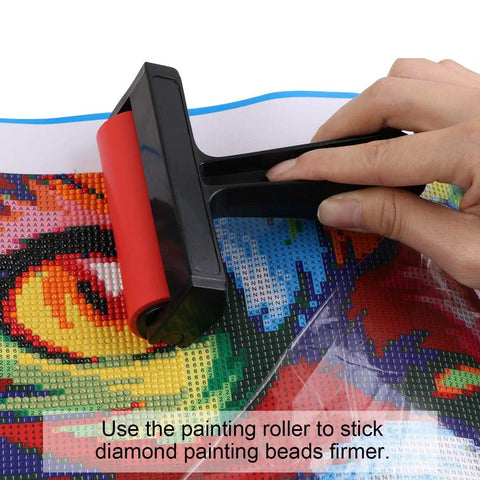 Hand using Diamond Painting Roller And Fix Tools Set For Full Drill Kits on colorful canvas for neat alignment