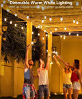 Group enjoying party under 48 Ft RGBIC Outdoor String Lights With 15 Dimmable LEDs IP65 Waterproof Color Changing Warm White