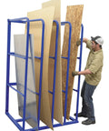 Heavy Duty Workhorse Steel Sheet Rack For Vertical Plywood Storage 84X50X44 Inches with sheets organized and a user in action.
