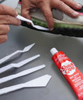 Clear Shoe Repair Adhesive Bundle With 3.7 Fl Oz Tube, 10 Snip Tip Applicators, And 5 Plastic Spreader Tools used on sneaker sole