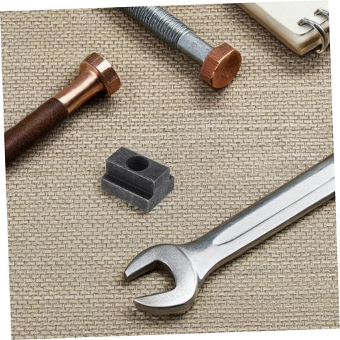 Six Piece Slot Fastening Nuts And Bolts Set For T Slot Tracks And Machine Tool Applications lying on textured surface