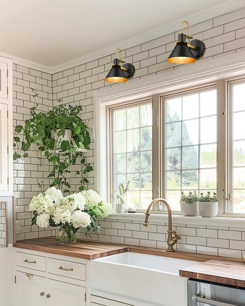 Kitchen with white tiles featuring a set of 2 industrial wall sconce lights modern 1 light vanity fixtures in matte black with brushed gold interior.