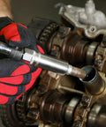 Magnetic Five Eighths Spark Plug Socket For Three Eighths Inch Drive Engine Tune Up Tool in use on engine
