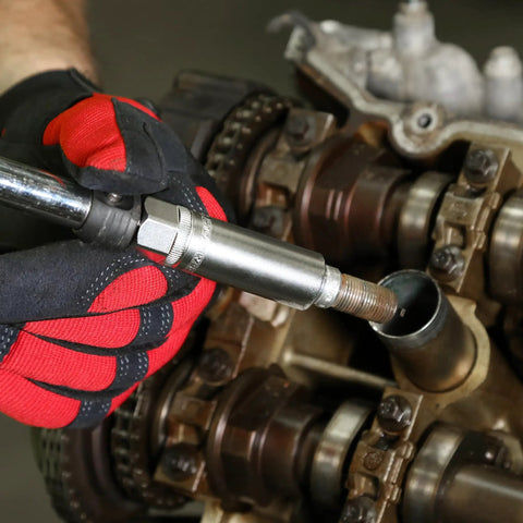 Magnetic Five Eighths Spark Plug Socket For Three Eighths Inch Drive Engine Tune Up Tool in use on engine