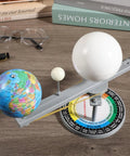 Sun Earth Moon Model For Classroom, Hands On Astronomy Teaching Tool, Orbital Simulator Demonstrating Day And Night, Seasons, Moon Phases, And Planetary Motion. Small plastic model on desk