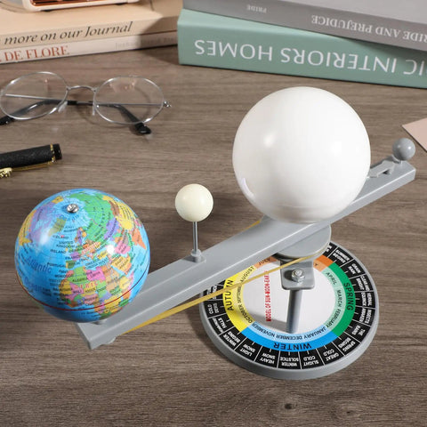 Sun Earth Moon Model For Classroom, Hands On Astronomy Teaching Tool, Orbital Simulator Demonstrating Day And Night, Seasons, Moon Phases, And Planetary Motion. Small plastic model on desk