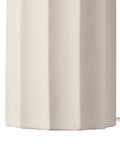 Close-up of the ribbed concrete base of the 20 Inch Rustic Table Lamp With Ribbed Concrete Base And White Linen Shade.