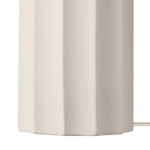 Close-up of the ribbed concrete base of the 20 Inch Rustic Table Lamp With Ribbed Concrete Base And White Linen Shade.