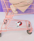 Four Piece 3 Inch Stainless Steel Swivel Caster Wheels With Twin Locking Brakes For Heavy Duty Industrial Trolleys on a pink cart.