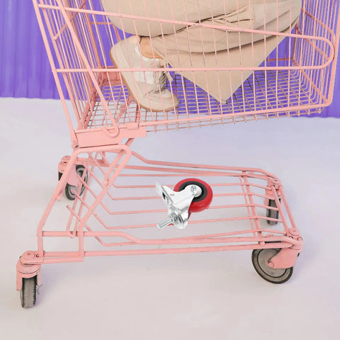 Four Piece 3 Inch Stainless Steel Swivel Caster Wheels With Twin Locking Brakes For Heavy Duty Industrial Trolleys on a pink cart.