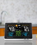 Wireless Color Weather Station With Mold Indicator on kitchen counter, displaying indoor/outdoor temperature, humidity, and forecast