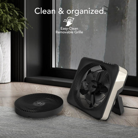 High Velocity Box Fan with Kick Stand, Digital Display, Removable Grille, Variable Speed Control shown in cool gray near window