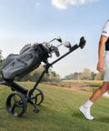 Built Tough Smart Follow Electric Golf Push Cart With Dual Radar Tracking And App Remote Control One Click Foldable Frame on green grass.