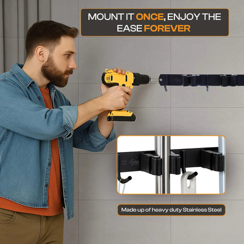 Person installing Heavy Duty Stainless Steel Broom Holder Wall Mount With 3 Racks And 4 Hooks on wall, close-up of holder