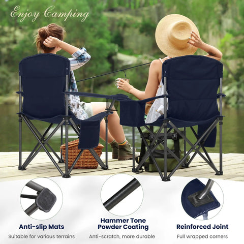 Two Beefy Oversized Camping Folding Chairs with Cup Holder and Cooler Bag in rugged blue by a lakeside, supports up to 450 lbs.