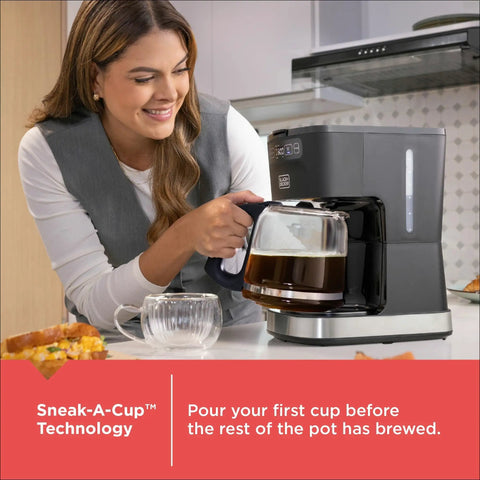 Woman using CafeCraft 12 Cup Programmable Coffee Maker With Stainless Steel Drip Design, visible Sneak A Cup feature