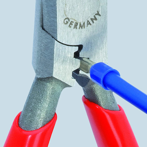 Close-up of Six And A Quarter Inch Electricians Four In One Pliers cutting a blue wire with induction hardened precision cutting edges.