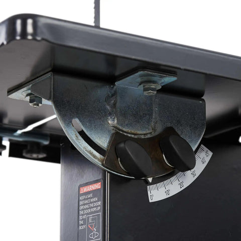 Close-up of powerful 4.2 amp 10-inch benchtop band saw adjustment mechanism with 45-degree tilt for woodworking precision.