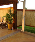 Natural Bamboo Fence Roll Panel 0.75 Inch Thick 6 Foot High By 8 Foot Long for outdoor privacy, shown installed on patio